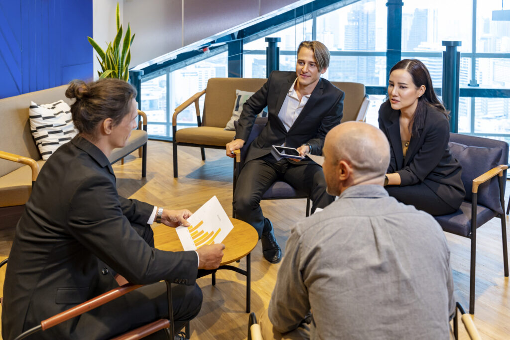 Private equity professionals in a London meeting room